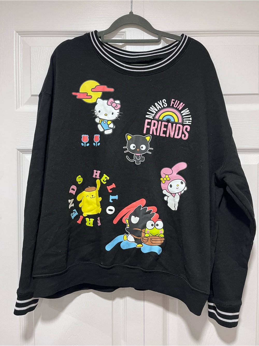 Hello Kitty Black Crewneck Sweatshirt with Colorful Friends Graphics